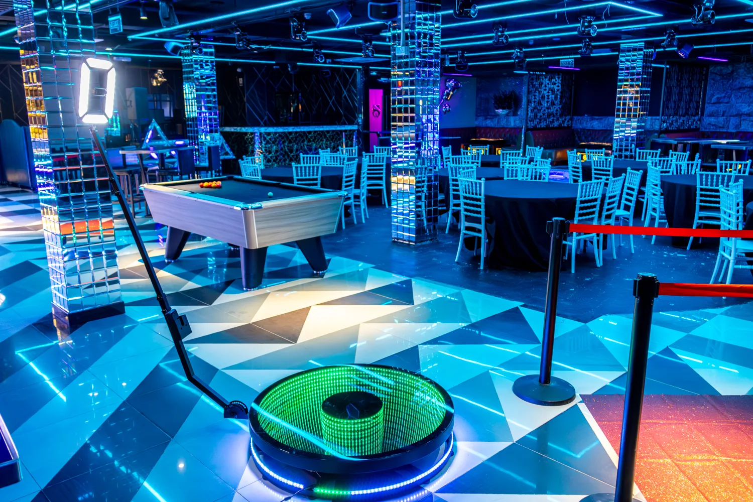 360 Glass Booth with LED platform at an event
