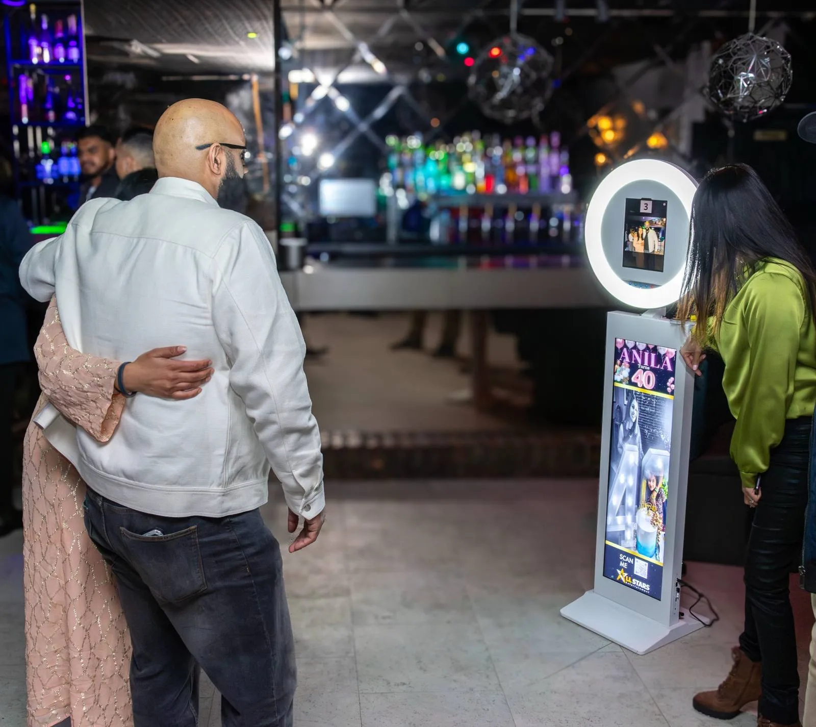 Guests enjoying an All Stars photo booth
