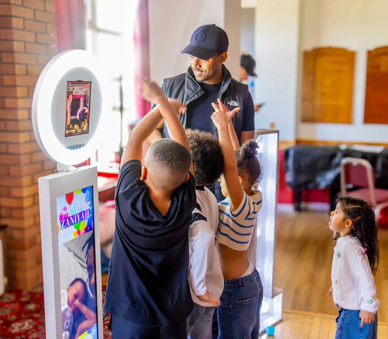 Interactive magic mirror photo booth at an event